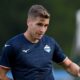 Toma Basic con la maglia della Lazio