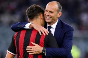 Allegri abbraccia un calciatore con la maglia del Milan, immagine creata con intelligenza artificiale