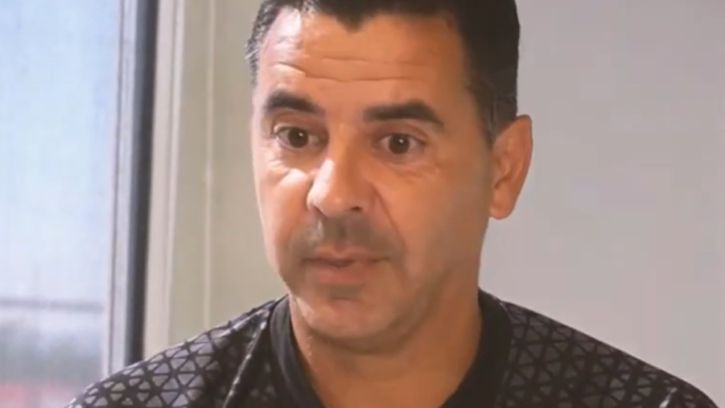 Michel durante un'intervista con lo sguardo concentrato