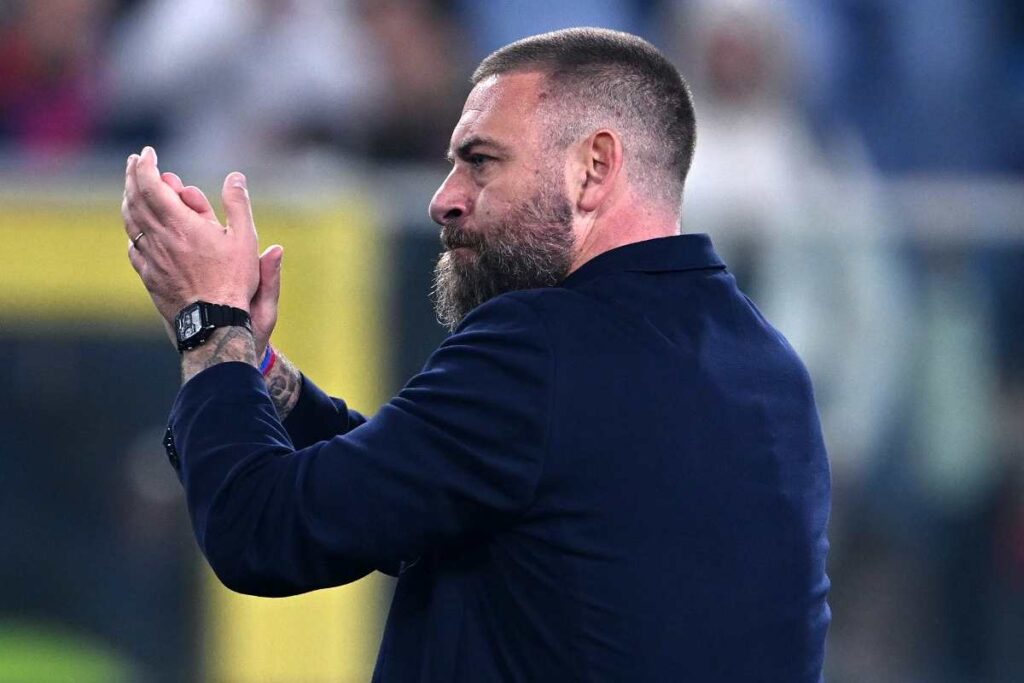 De Rossi applauso