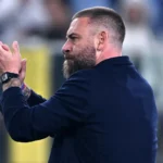 De Rossi applauso