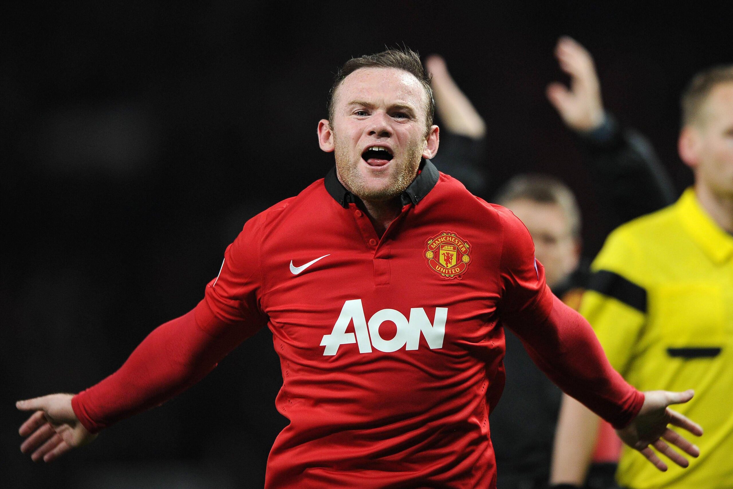 rooney esulta manchester united champions marzo 2014 ifa scaled